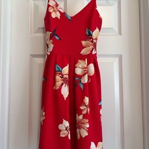 Soprano Red spaghetti strap floral dress.  Size small this dress is a pull on.